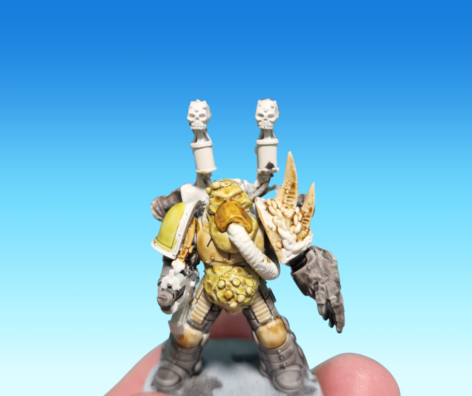A converted Plague Marine of Nurgle ruined with contrast paints